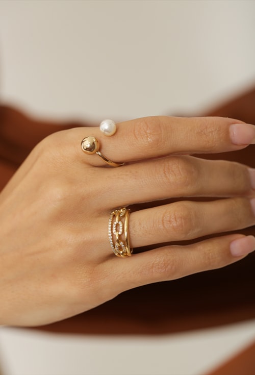 ANEL AJUSTÁVEL COM BOLA E PÉROLA AN391-O ANEL AJUSTÁVEL COM BOLA E PÉROLA AN391-O