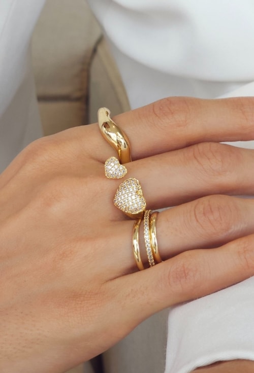 ANEL AJUSTÁVEL COM CORAÇÕES CRAVEJADOS AN589-O ANEL AJUSTÁVEL COM CORAÇÕES CRAVEJADOS AN589-O