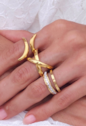 ANEL AJUSTÁVEL COM DESIGN EM X DOURADO AN559-AD