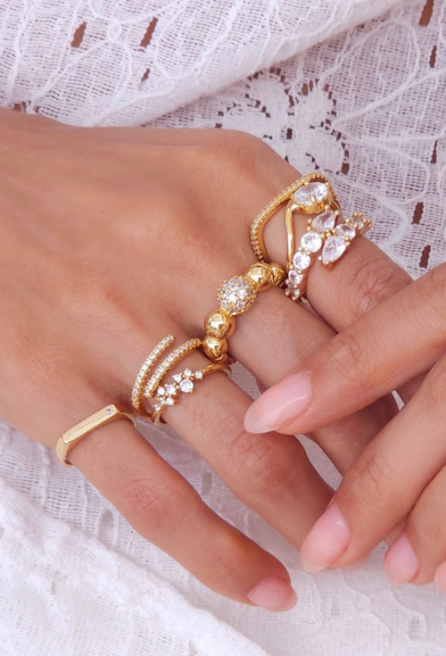 ANEL AJUSTÁVEL DOURADO COM DESIGN TORCIDO AN552-O