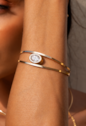 BRACELETE COM PEDRA OVAL CRISTAL BANHADO A OURO PM647-O