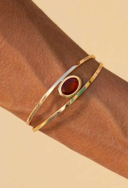 BRACELETE COM PEDRA OVAL MARROM BANHADO A OURO PM647-O