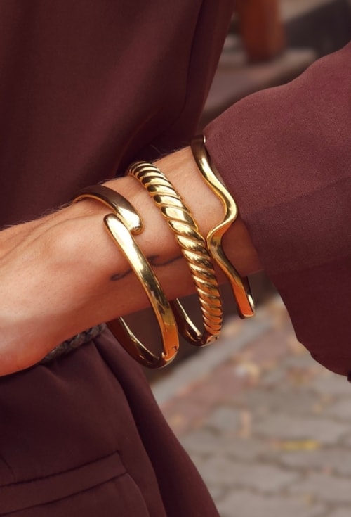BRACELETE ONDULADO AÇO INOX DOURADO PM613-AD