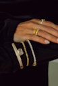 BRACELETE REDONDO CRAVEJADO COM PEDRA RETANGULAR BANHADO A OURO 18K PM657-O
