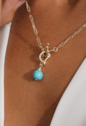 PINGENTE COM TURQUESA NATURAL BANHADO A OURO PG193-O