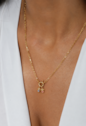 PINGENTE MENINO COM PEDRAS SAFIRA BANHADO A OURO PG190-O