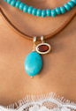 PINGENTE OVAL COM PEDRA TURQUESA BANHADO A OURO PG209-O
