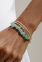 PULSEIRA ASSIMÉTRICA COM ÁGUA-MARINHA BANHADA A OURO PM649-O