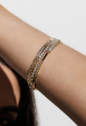 PULSEIRA COM PLACA RETANGULAR E ZIRCÔNIAS BANHADA A OURO PM636-O