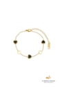 PULSEIRA CORAÇÃO VAZADO PRETO EM AÇO DOURADO PM566-AD
