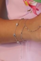 PULSEIRA DELICADA COM GOTAS LISAS NO RÓDIO PM496-R