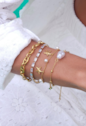 PULSEIRA ESTRELA DO MAR COM PÉROLAS EM AÇO INOX DOURADO PM522-AD
