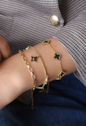 PULSEIRA INSIRAÇÃO AÇO INOX DOURADO TREVOS ÔNIX PM461-O