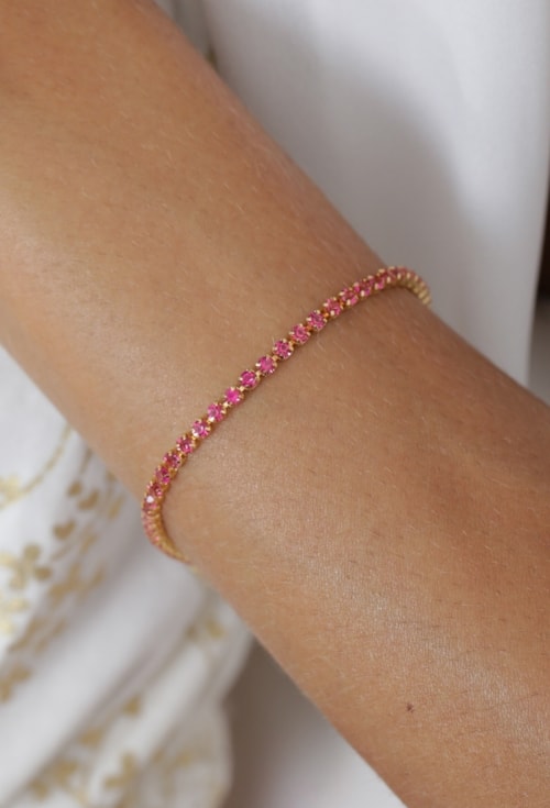 PULSEIRA RIVIERA RUBELITA NO OURO PM041-O