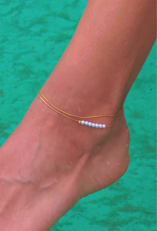 TORNOZELEIRA DUPLA COM PÉROLAS DOURADA TZM017-AD TORNOZELEIRA DUPLA COM PÉROLAS DOURADA TZM017-AD